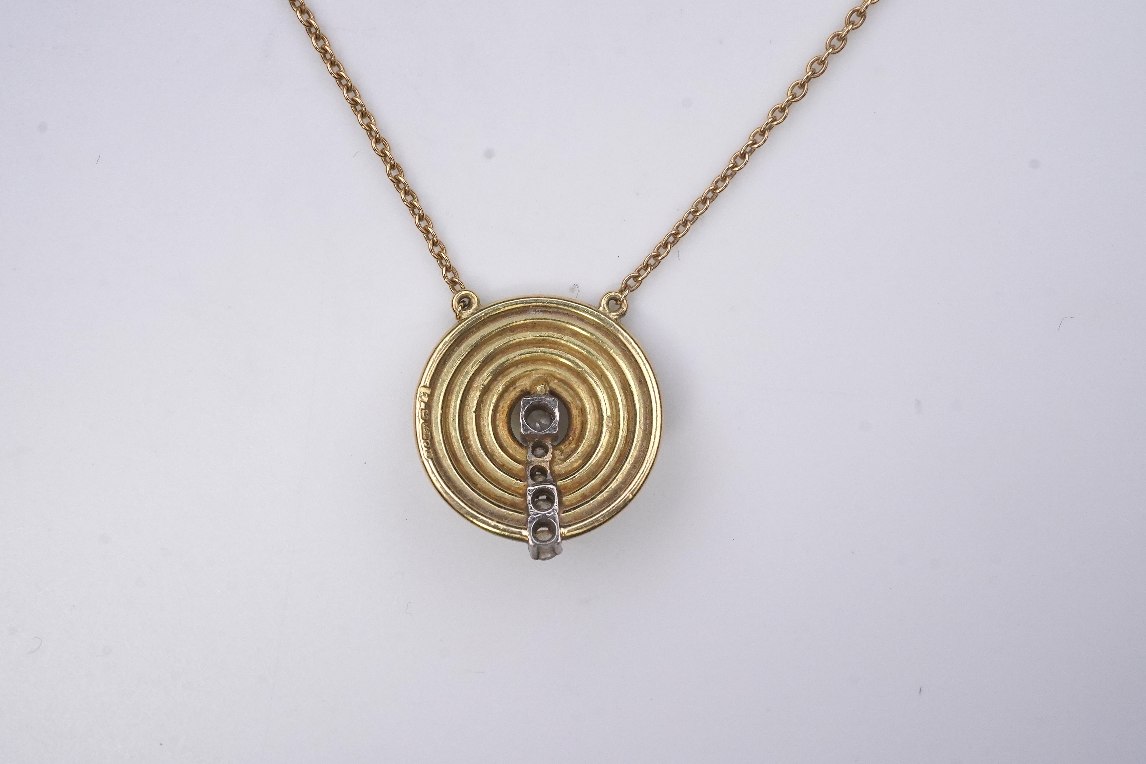 An 18ct gold and diamond pendant, circa 1978